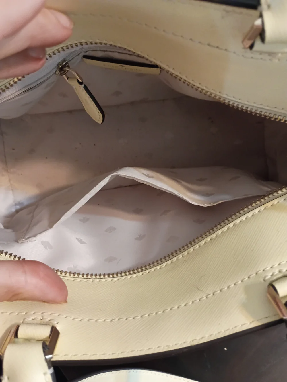 Kate Spade Staci Medium Satchel in a light yellow colorway.